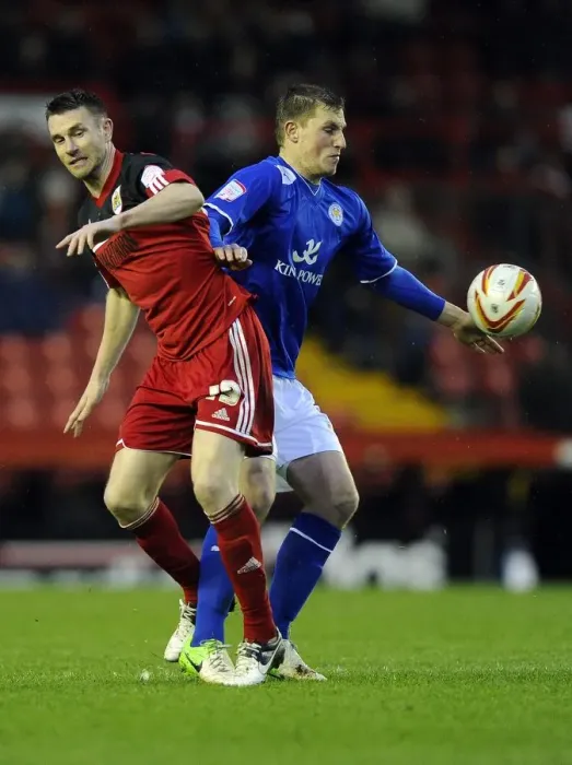 Framed Print : Battling for Supremacy: McManus vs. Wood in the Championship Clash between Bristol City and Leicester City