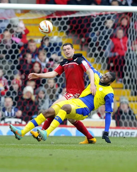 Framed Print : Battling for Supremacy: Moloney vs. Helan in the Npower Championship Clash between Bristol City and Sheffield Wednesday