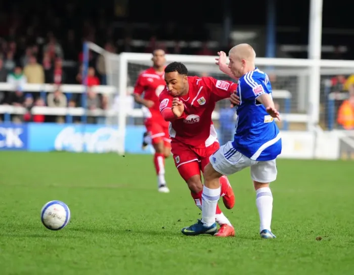 Framed Print : Battling for Supremacy: Nicky Maynard vs. Tommy Williams in Peterborough v Bristol City Championship Clash, 2010 Framed Print : Battling for Supremacy: Nicky Maynard vs. Tommy Williams in Peterborough v Bristol City Championship Clash, 2010