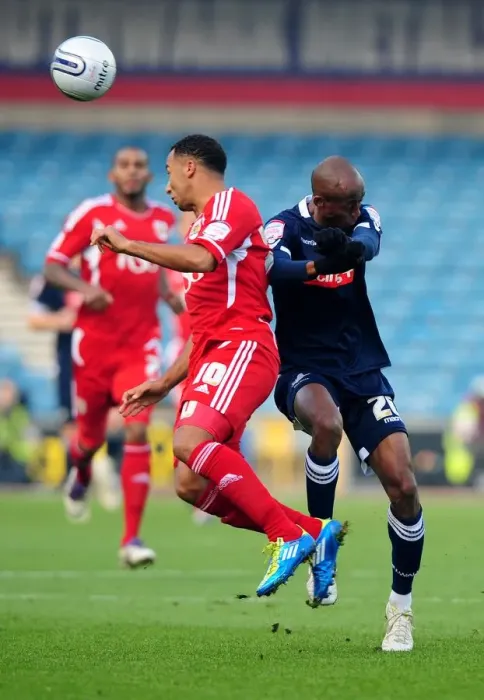 Framed Print : Battling for Supremacy: Nicky Maynard vs. Jimmy Abdou in Millwall vs. Bristol City Championship Clash (November 2011)