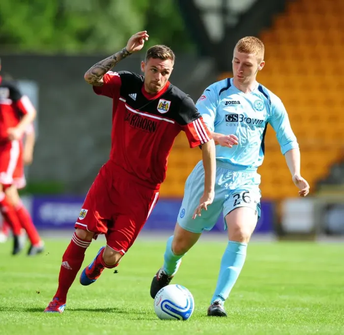 Framed Print : Battling for Supremacy: Paul Anderson vs. Liam Caddis in the Pre-Season Clash between St Johnstone and Bristol City Framed Print : Battling for Supremacy: Paul Anderson vs. Liam Caddis in the Pre-Season Clash between St Johnstone and Bristol City