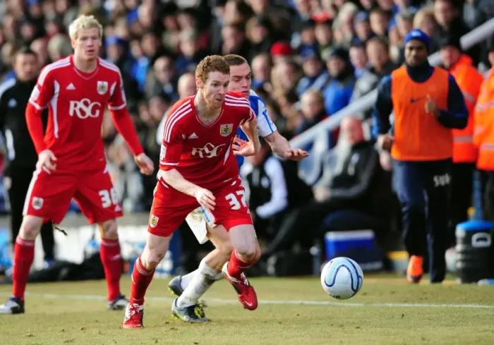 Framed Print : Battling for Supremacy: Pearson vs. Taylor in Peterborough United vs. Bristol City Football Clash