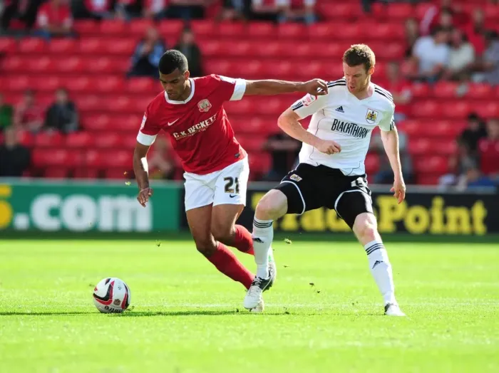 Framed Print : Battling for Supremacy: Pearson vs. Mellis in the Championship Clash between Barnsley and Bristol City Framed Print : Battling for Supremacy: Pearson vs. Mellis in the Championship Clash between Barnsley and Bristol City