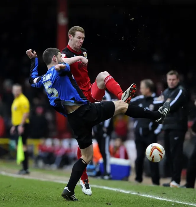 Framed Print : Battling for Supremacy: Pearson vs. Delap in Npower Championship Clash between Bristol City and Barnsley