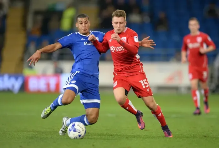 Framed Print : Battling for Supremacy: Peltier vs. Freeman in Cardiff City vs. Bristol City Championship Clash Framed Print : Battling for Supremacy: Peltier vs. Freeman in Cardiff City vs. Bristol City Championship Clash