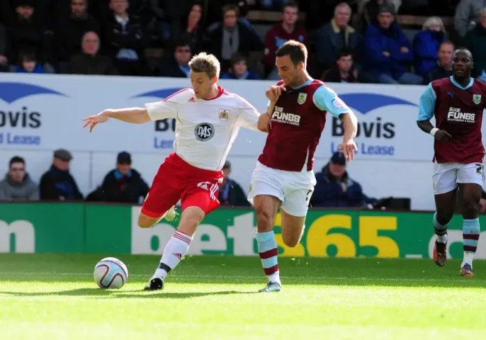 Framed Print : Battling for Supremacy: Ribeiro vs. Fox in the Burnley vs. Bristol City Championship Clash, 2010 Framed Print : Battling for Supremacy: Ribeiro vs. Fox in the Burnley vs. Bristol City Championship Clash, 2010