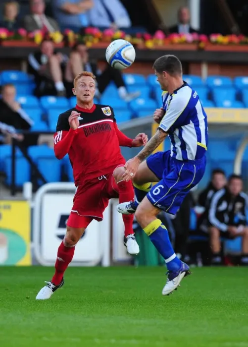 Framed Print : Battling for Supremacy: Ryan Taylor vs Michael Nelson in Kilmarnock vs Bristol City Pre-Season Clash Framed Print : Battling for Supremacy: Ryan Taylor vs Michael Nelson in Kilmarnock vs Bristol City Pre-Season Clash