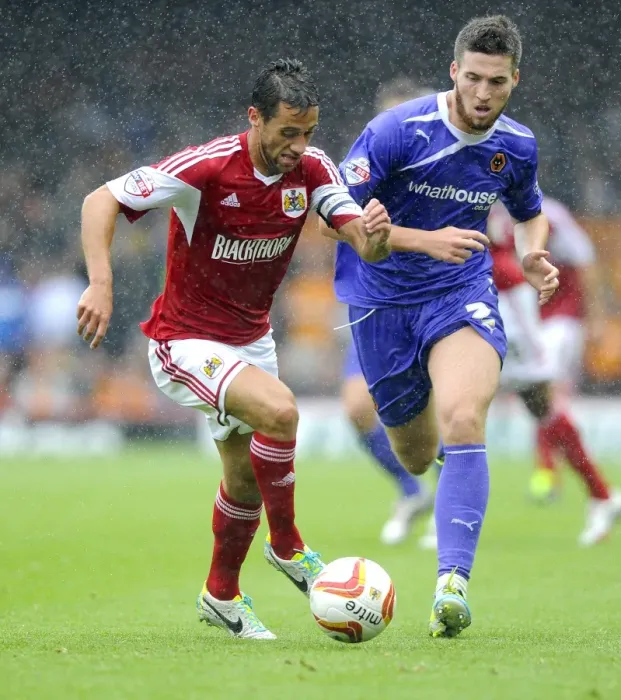 Framed Print : Battling for Supremacy: Sam Baldock vs. Matt Doherty in the Heat of Bristol City vs. Wolves Rivalry