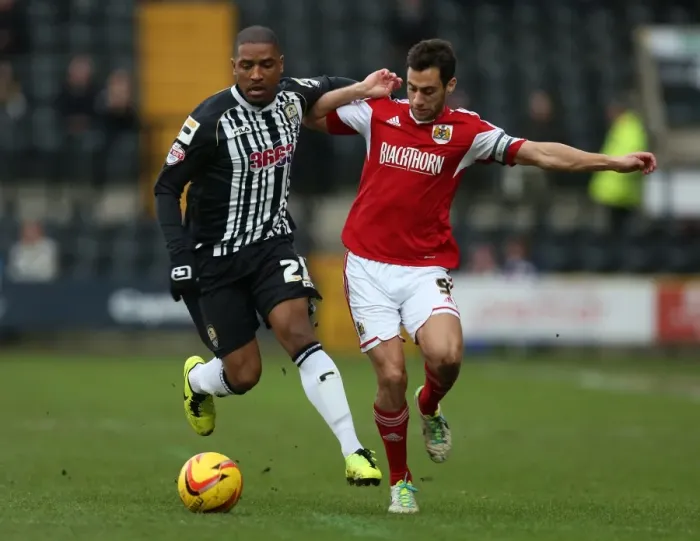 Framed Print : Battling for Supremacy: Sam Baldock vs. Andre Boucaud in Notts County vs. Bristol City Football Match, December 2013