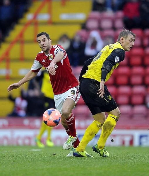 Battling for Supremacy: Sam Baldock vs. Joel Ekstrand in the FA Cup Third Round Clash between Bristol City and Watford