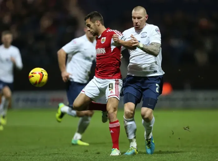 Framed Print : Battling For Supremacy: Sam Baldock vs Jack King in Preston North End vs Bristol City Clash