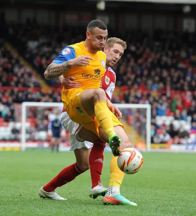 Framed Print : Battling for Supremacy: Wagstaff vs. Davies in the Heat of Bristol City vs. Preston North End Rivalry