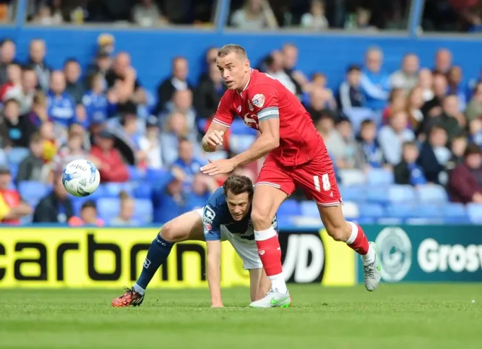 Framed Print : Battling for Supremacy: Wilbraham vs. Spector in Birmingham City vs. Bristol City Clash
