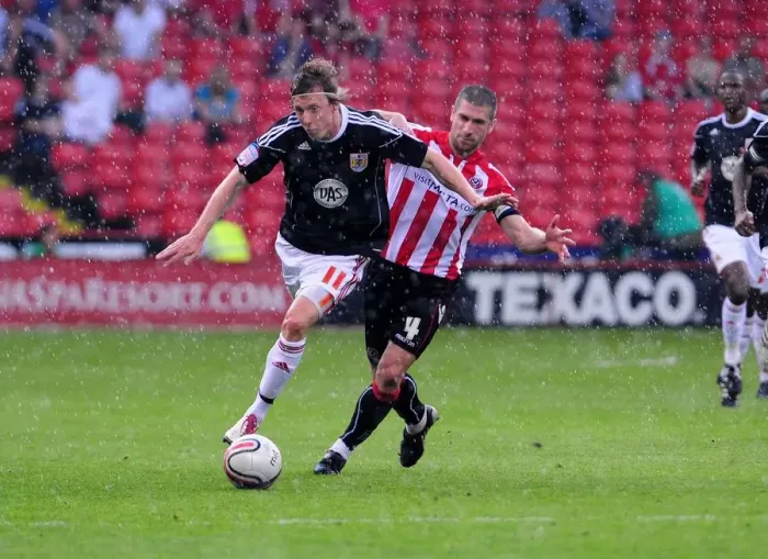 Framed Print : Battling for Supremacy: Woolford vs. Montgomery in the Championship Clash between Sheffield United and Bristol City (April 2011) Framed Print : Battling for Supremacy: Woolford vs. Montgomery in the Championship Clash between Sheffield United and Bristol City (April 2011)