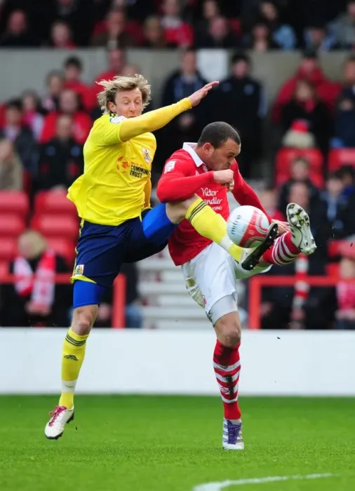 Framed Print : Battling for Supremacy: Woolford vs. Lynch in Nottingham Forest vs. Bristol City Football Match, 07-04-2012 Framed Print : Battling for Supremacy: Woolford vs. Lynch in Nottingham Forest vs. Bristol City Football Match, 07-04-2012