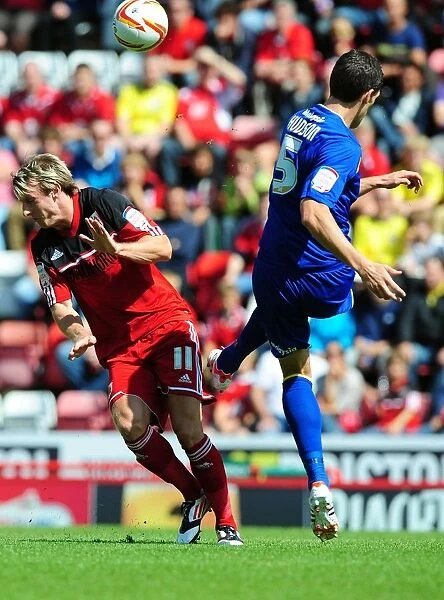 Battling for Supremacy: Woolford vs. Hudson in the Bristol City vs. Cardiff City Championship Clash