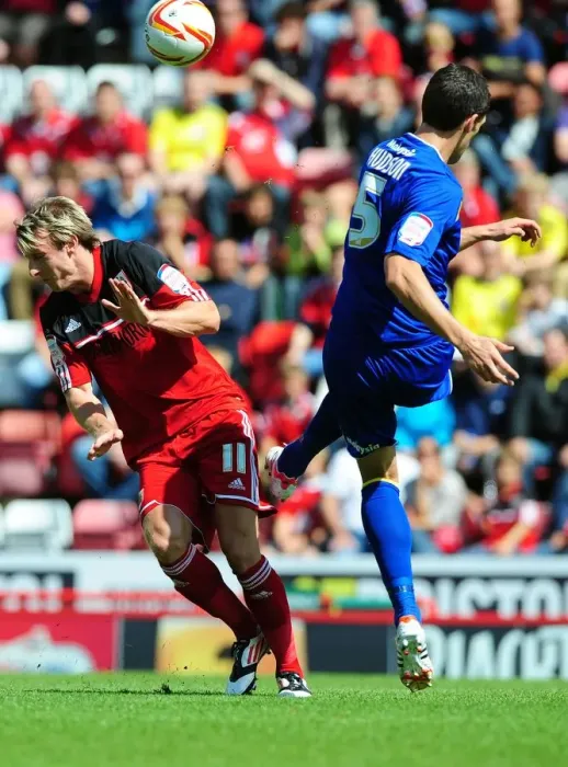 Framed Print : Battling for Supremacy: Woolford vs. Hudson in the Bristol City vs. Cardiff City Championship Clash Framed Print : Battling for Supremacy: Woolford vs. Hudson in the Bristol City vs. Cardiff City Championship Clash