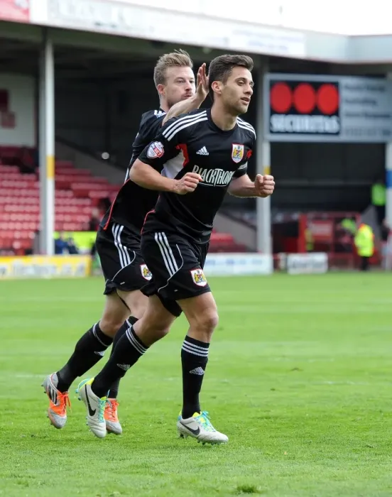 Framed Print : Battling for Victory: Sam Baldock and Wade Elliott Celebrate for Bristol City in Walsall Match, April 2014