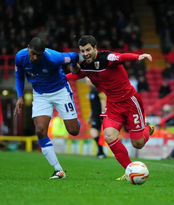 Framed Print : Battling Wings: Foster vs. Little in the Championship Clash between Bristol City and Peterborough