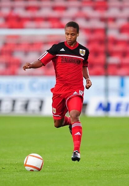 Bobby Reid in Action: Bristol City's Star Player Shines in Pre-Season Friendly Against Dunfermline Athletic, 2012
