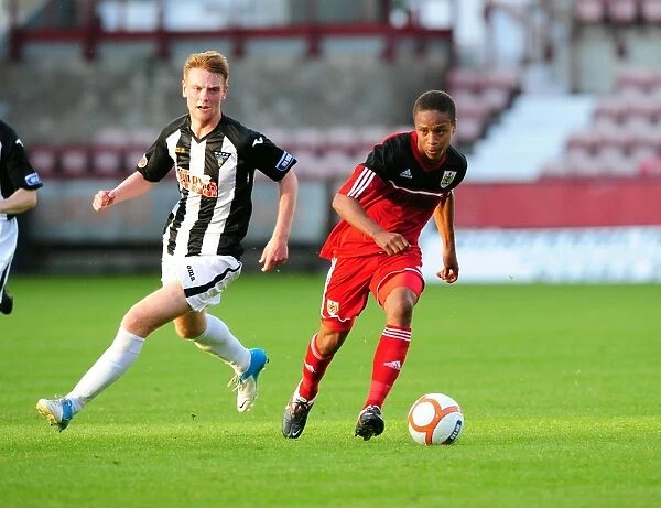 Bobby Reid in Action: A Thrilling Pre-Season Football Moment at Dunfermline's East End Park