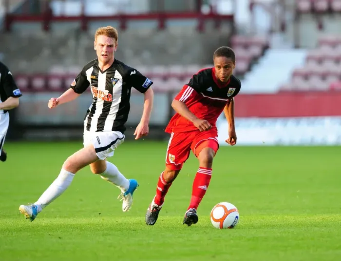Framed Print : Bobby Reid in Action: A Thrilling Pre-Season Football Moment at Dunfermline's East End Park