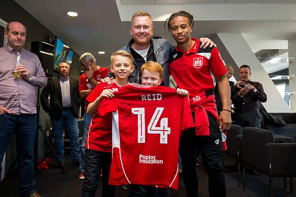 Bobby Reid of Bristol City Presents Sponsors with Signed Shirt after Championship Match against Birmingham City