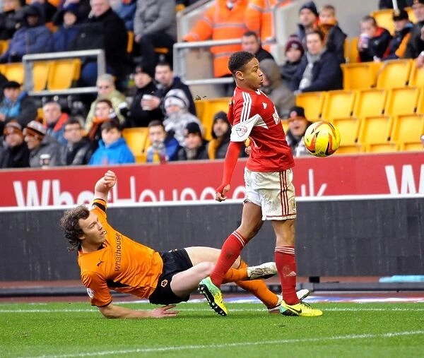 Bobby Reid Dodges a Challenge from Kevin McDonald during Wolves vs. Bristol City (January 25, 2014)