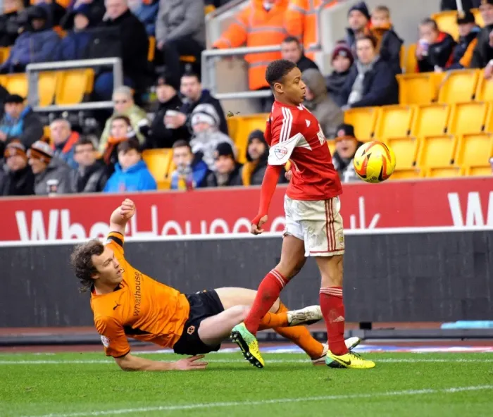 Framed Print : Bobby Reid Dodges a Challenge from Kevin McDonald during Wolves vs. Bristol City (January 25, 2014) Framed Print : Bobby Reid Dodges a Challenge from Kevin McDonald during Wolves vs. Bristol City (January 25, 2014)