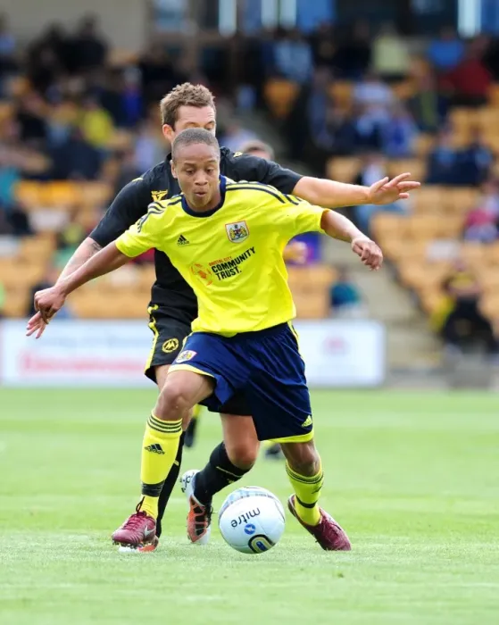 Framed Print : Bobby Reid Fights for Possession: Torquay vs. Bristol City