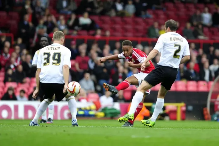 Framed Print : Bobby Reid Goes for Glory: Bristol City vs Colchester United, 2013