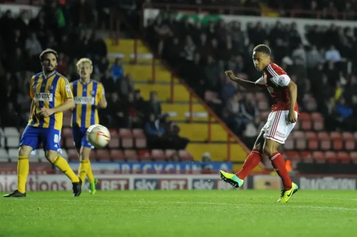 Framed Print : Bobby Reid Goes for Glory: A Pivotal Moment in the Bristol City vs. Brentford Football Match, October 2013