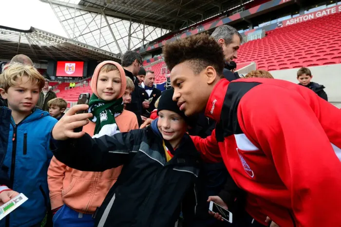 Framed Print : Bobby Reid Interacts with Young Fans after Bristol City vs Ipswich Town Match