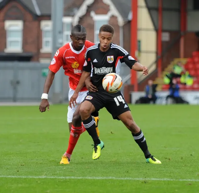 Framed Print : Bobby Reid Under Pressure: A Moment from Crewe vs. Bristol City Football Match, October 2013