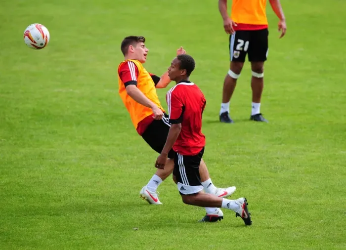 Framed Print : Bobby Reid Soars Over Joe Edwards: A Moment from Bristol City's Pre-Season Training, 2012