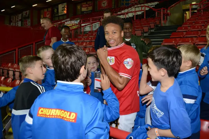 Framed Print : Bobby Reid Surrounded by Adoring Fans at Ashton Gate after Bristol City vs Fulham Match Framed Print : Bobby Reid Surrounded by Adoring Fans at Ashton Gate after Bristol City vs Fulham Match