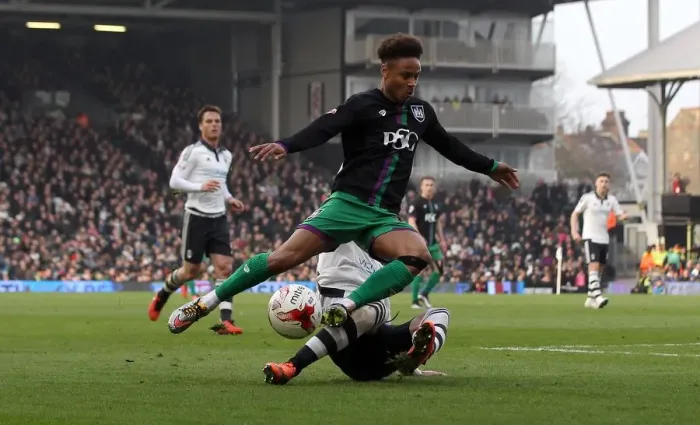 Framed Print : Bobby Reid Tackled in Fulham vs. Bristol City Championship Clash Framed Print : Bobby Reid Tackled in Fulham vs. Bristol City Championship Clash