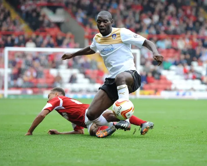 Framed Print : Bobby Reid Tackles Jabo Ibehre in Intense Football Action at Ashton Gate, Bristol City vs Colchester United Framed Print : Bobby Reid Tackles Jabo Ibehre in Intense Football Action at Ashton Gate, Bristol City vs Colchester United