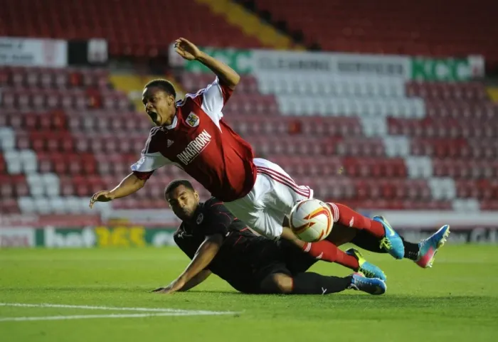 Framed Print : Bobby Reid vs Adrian Mariappa: Intense Penalty Box Clash in Bristol City vs Reading Football Match