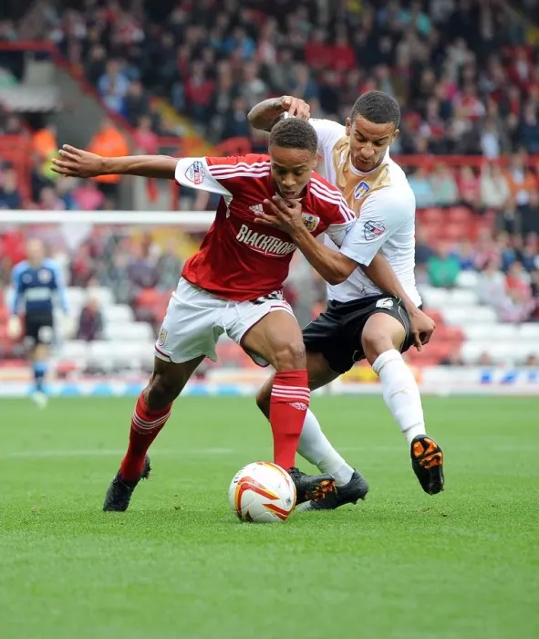Framed Print : Bobby Reid vs Craig Eastmond: A Fight for Supremacy in the Sky Bet League One Clash, Bristol City vs Colchester United, 2013 Framed Print : Bobby Reid vs Craig Eastmond: A Fight for Supremacy in the Sky Bet League One Clash, Bristol City vs Colchester United, 2013