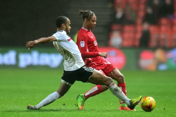 Framed Print : Bobby Reid vs Dennis Odoi: Intense Battle at Ashton Gate - Bristol City vs Fulham, Sky Bet Championship