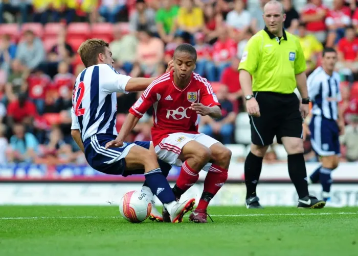 Framed Print : Bobby Reid vs. James Morrison: A Battle for Possession in the 2011 Championship Clash between Bristol City and West Brom Framed Print : Bobby Reid vs. James Morrison: A Battle for Possession in the 2011 Championship Clash between Bristol City and West Brom