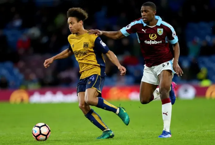 Framed Print : Bobby Reid vs Tendayi Darikwa: A FA Cup Battle at Turf Moor