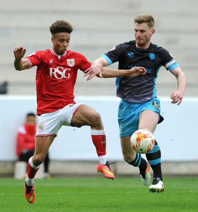 Framed Print : Bobby Reid vs Tom Lees: Intense Battle for Possession in Bristol City vs Sheffield Wednesday Championship Clash Framed Print : Bobby Reid vs Tom Lees: Intense Battle for Possession in Bristol City vs Sheffield Wednesday Championship Clash