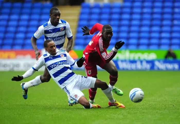 Framed Print : Bolasie Fouled by Cummings: Reading vs. Bristol City, Championship Match, 28 / 01 / 2012 Framed Print : Bolasie Fouled by Cummings: Reading vs. Bristol City, Championship Match, 28 / 01 / 2012