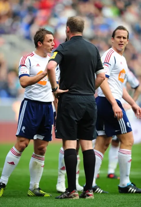 Framed Print : Bolton Wanderers Steven Warnock Protests Innocence Amidst Championship Clash vs. Bristol City Framed Print : Bolton Wanderers Steven Warnock Protests Innocence Amidst Championship Clash vs. Bristol City