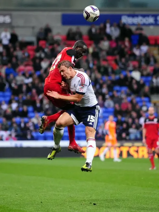 Framed Print : Bolton's Warnock Fouls Albert Adomah of Bristol City - Championship Clash, 2012 Framed Print : Bolton's Warnock Fouls Albert Adomah of Bristol City - Championship Clash, 2012