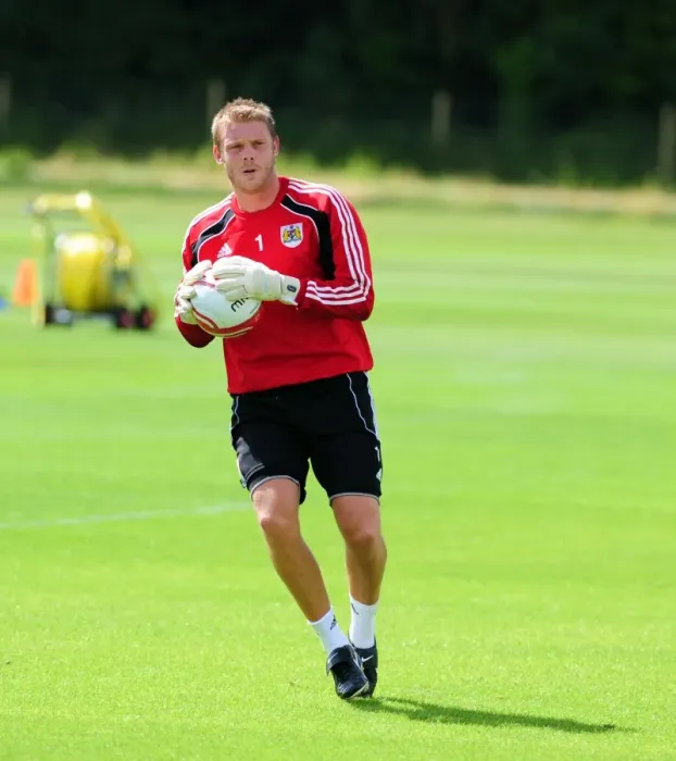 Framed Print : Brace for Impact: Dean Gerken's Unwavering Focus in Bristol City's Pre-Season Training Framed Print : Brace for Impact: Dean Gerken's Unwavering Focus in Bristol City's Pre-Season Training