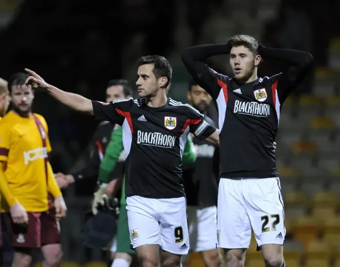 Framed Print : Bradford vs. Bristol City: Sam Baldock Seeks Medical Attention for Wes Burns Head Injury (January 11, 2014)