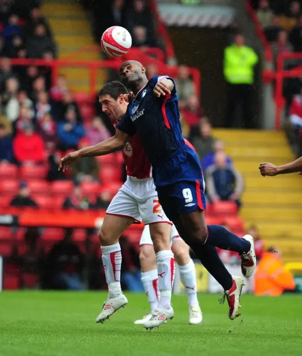 Framed Print : Bradley Orr vs. Dele Adebola: Aerial Battle in the Championship Clash between Bristol City and Nottingham Forest - 03 / 04 / 2010 Framed Print : Bradley Orr vs. Dele Adebola: Aerial Battle in the Championship Clash between Bristol City and Nottingham Forest - 03 / 04 / 2010